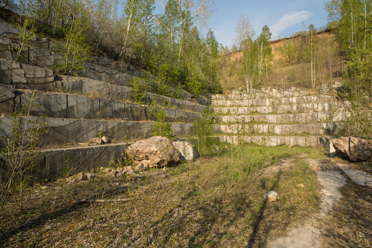 mining of marble in an open way. an old marble quarry. Russia, Novosibirsk region.Iskitim
