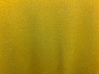 Yellow cotton fabric texture used as background. Empty yellow fabric background of soft and smooth textile material. There is space for text...