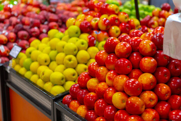 Assortment of fresh fruits on counter in supermarket