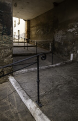 Old stairs with wrought iron railing