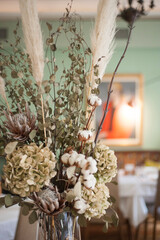 Fototapeta premium Flowers on table, restaurant