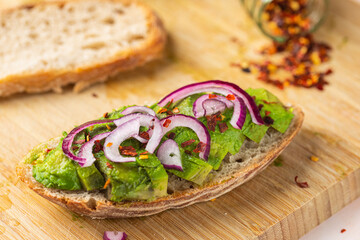 Vegan Avocado Toast with Red Onions and Chilli Flakes