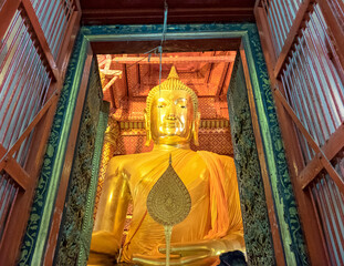 Ayutthaya,Thailand - May 09 2015 : Big buddha statue golden elegant in chapel at wat phanan choeng...