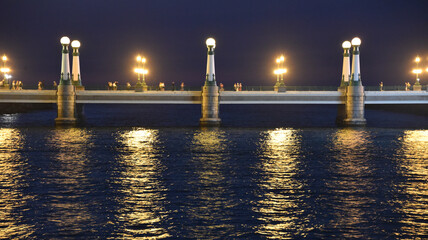 San Sebastian, Spain - 29 Aug 2021: Lights from the Kursal Bridge reflecting on the waters of the...