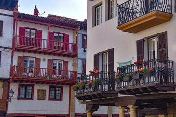 Hondarribia, Spain - 29 Aug 2021: Traditional Basque houses in the cobble stone streets of old town Hondarribia