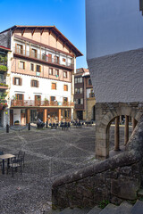 Fototapeta premium Hondarribia, Spain - 29 Aug 2021: Traditional Basque houses in the Plaza Gipuzkoa in old town Hondarribia