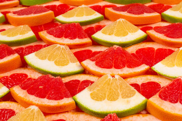 Pomelo and grapefruit slices background.