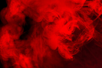 Obraz na płótnie Canvas Red steam on a black background.