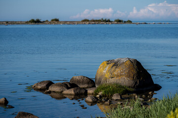 An ocean boulder in beautiful sunset light. Picture from the Baltic Sea island of Oland