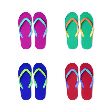 Set with different colorful flip flops on white background, top view
