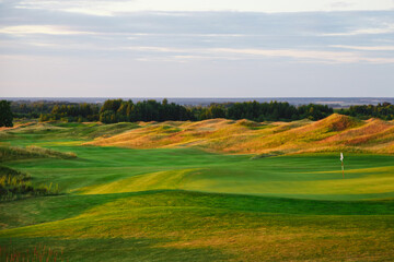Links. Summer landscape overlooking the hills of the golf course.