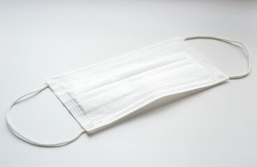 .White mask on a white background