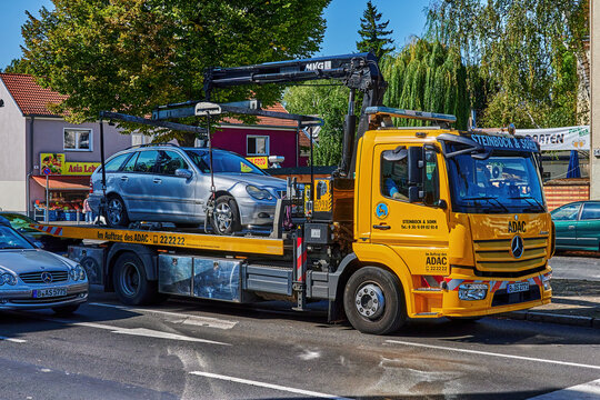Berlin, Germany - September 17, 2020: Emergency truck of the automobile club ADAC with a vehicle on the load bed.