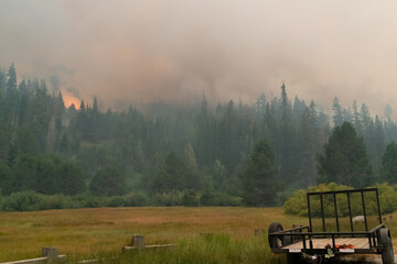Naklejka premium Flames approaching Highway 50 during Caldor Fire in California