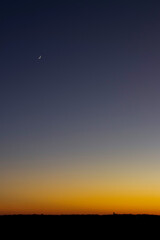 Obraz na płótnie Canvas moon slivers and sunsets