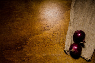 Onions on rustic background