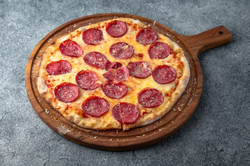 Tasty hot italian pizza Pepperoni with Mozzarella, Tomato Sauce. Pizzeria menu. 
