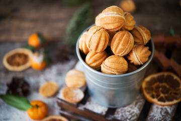 Christmas sweets cookies nuts with condensed milk on the festive table, Christmas decorations