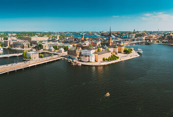 Fototapeta na wymiar Stockholm, Sweden. Scenic View Of Stockholm Skyline At Sunny Summer Day. Famous Popular Destination Scenic Place. Riddarholm Church In Panorama Panoramic View