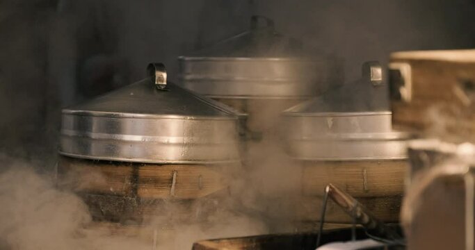 Close view of cool smoking bamboo steamers
