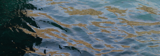 Light reflected off the sea at Kynance Cove Cornwall