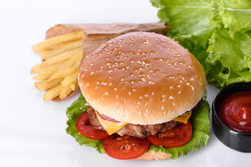 Craft beef burger and french fries on a white background
