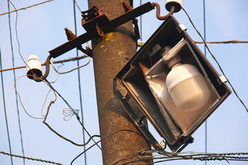 illumination in the poor district of the city. old light pole