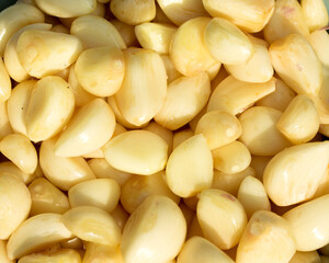 Closeup of peeled garlic cloves