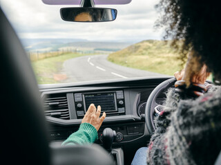 Women traveling by car