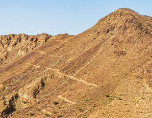Mountains surrounding Al Al Rafisah Dam in Sharjah Emirate. Outdoor