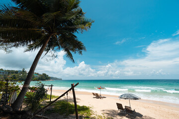 Umbrella and chairs colorful to sleep and relax on the beach.