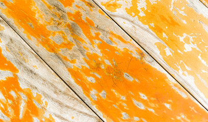 Orange flaky background color and wooden texture.