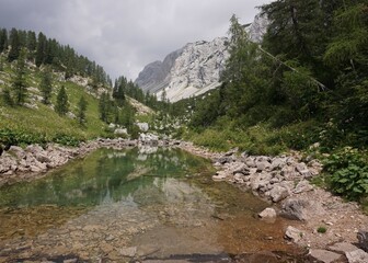 Reflection on a small pond on the Seven Lakes Valley HIke
