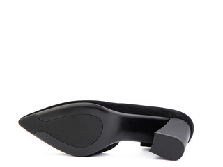 Classic and elegant suede high-heeled women shoes. Stylish black shoes on high block heels and with a pointed toe. Isolated object close up on white background. Shoe sole view. Fashion shoes.