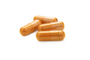 Turmeric Capsule isolated on white background with clipping path
