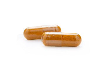 Turmeric Capsule isolated on white background with clipping path