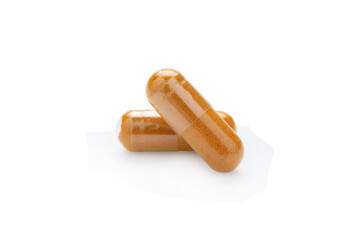 Turmeric Capsule isolated on white background with clipping path