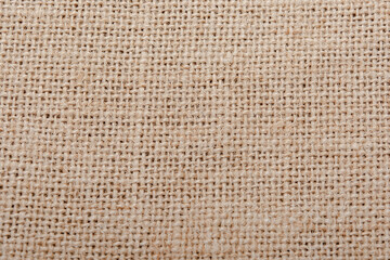 Burlap, sackcloth brown grainy cotton cloth texture background.