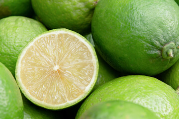 Lime slice citrus fruits background. Fresh juicy limes. Healthy food.