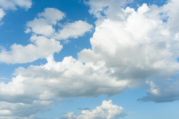 Obraz na płótnie Canvas Cirrus and cumulus clouds on blue sky background..