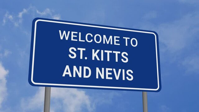 Welcome to St Kitts and Nevis Road Sign on Clear Blue Sky with Rapid Moving Clouds