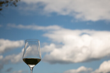 wine glass with clouds and blue heaven