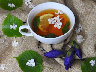 Flower tea with lemon.