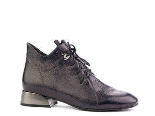 Women's autumn purple leather jodhpur boots with laces and average heels, isolated white background. Right side view. Fashion shoes. Photoshoot for shoe shop concept.