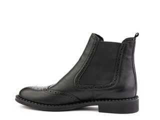 black leather chelsea boots with black elasticated side details, pattern details and black rubber sole. Isolated close-up on white background. Left side view. Fashion shoes.