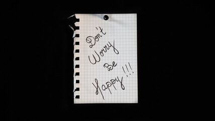 Hand written message on a ripped notebook sheet, 