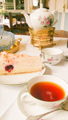 Tea time with cake and cream