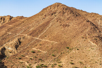 Mountains surrounding Al Al Rafisah Dam in Sharjah Emirate. Outdoor