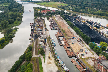 Many rivers merge into one. Anchorage for barges carrying coal, Poland Wroclaw