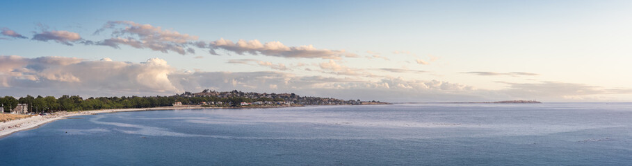 Panoramic View of Residential Homes in a modern city on the West Coast of Pacific Ocean. Victoria, Vancouver Island, British Columbia, Canada. Cloudy Colorful Sky Art Render.
